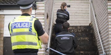 Police hunt suspect after man knifed in the neck and hit over head with brick