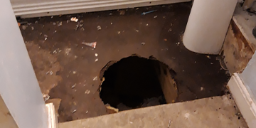 Hole lot of trouble: Police find sex offender hiding in floor covered by rug