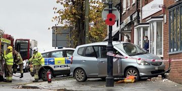 Main road gridlocked after car crashes into Royal Wootton Bassett shop