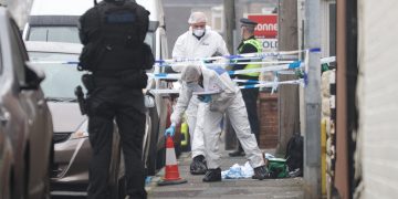 Man, 57, shot dead by police responding to disturbance in street