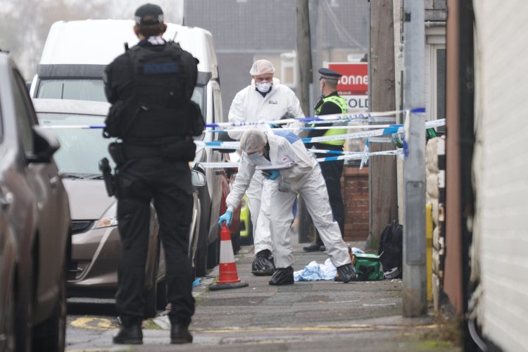 Man, 57, shot dead by police responding to disturbance in street