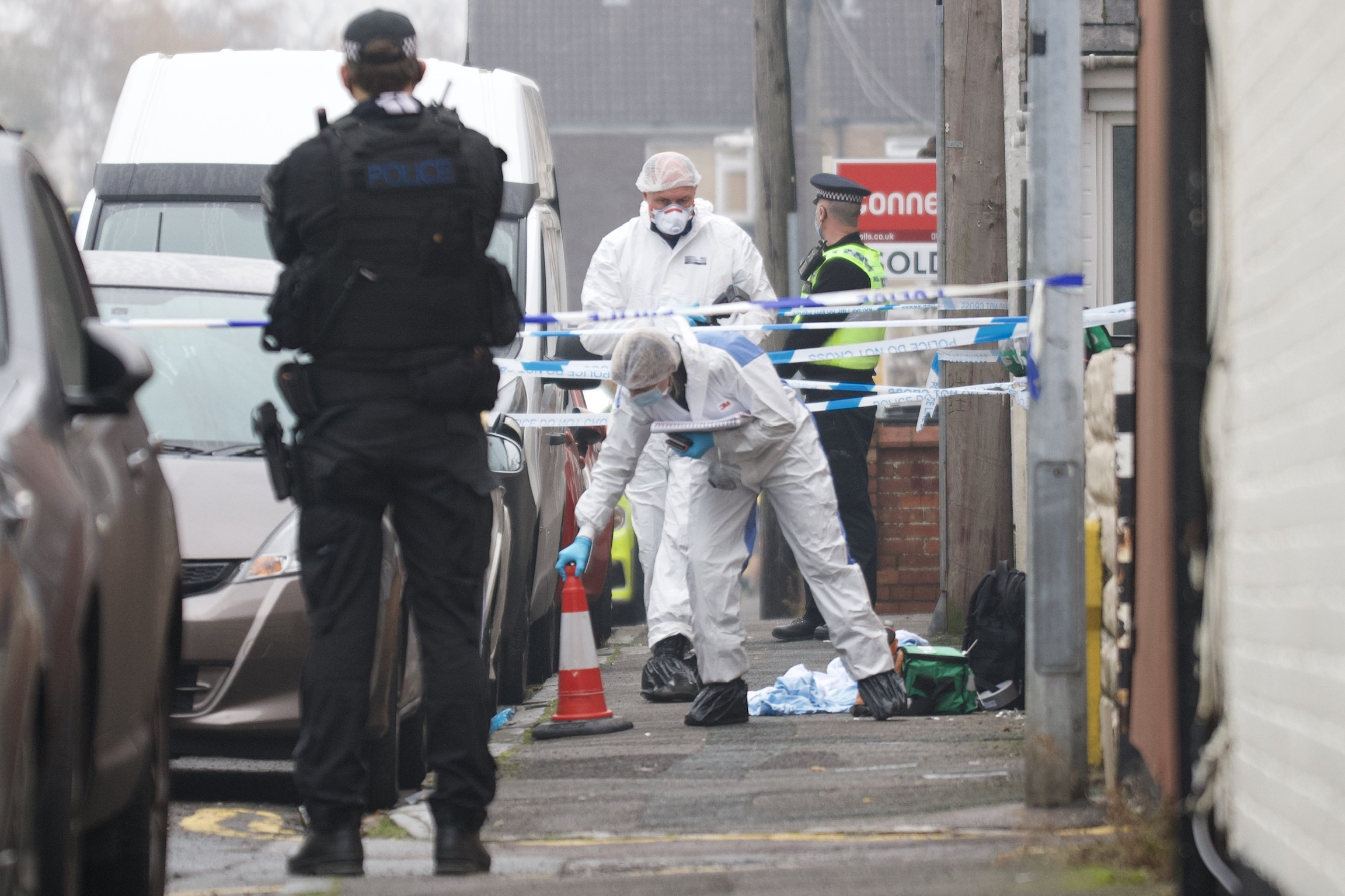 Man, 57, shot dead by police responding to disturbance in street