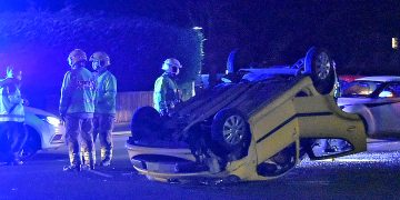 Road partially blocked 999 crews respond to vehicle on roof in Melksham