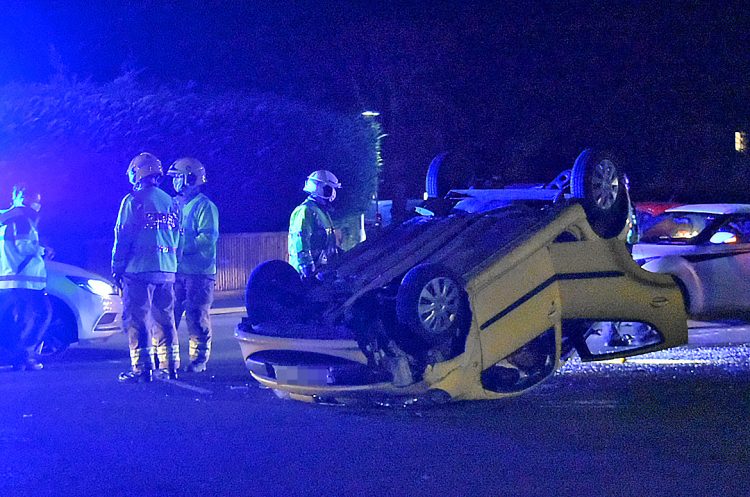 Road partially blocked 999 crews respond to vehicle on roof in Melksham