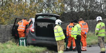 Road closed after car collides with wall at roadside near Bradford on Avon