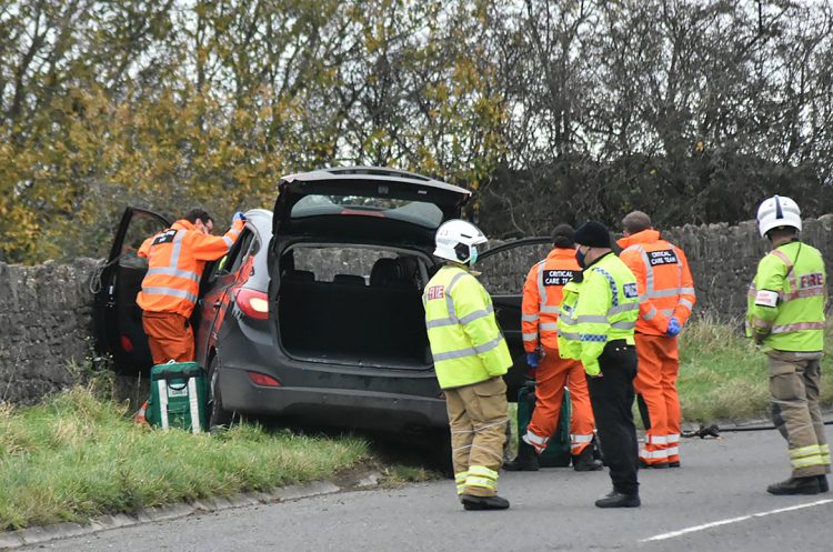 Road closed after car collides with wall at roadside near Bradford on Avon