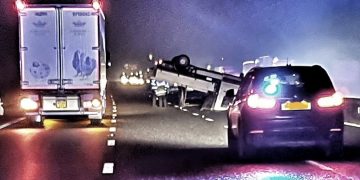 Manhunt after driver ditches overturned van in middle of pitch-black motorway