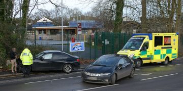 Two-vehicle collision partially blocks road outside Corsham Primary School