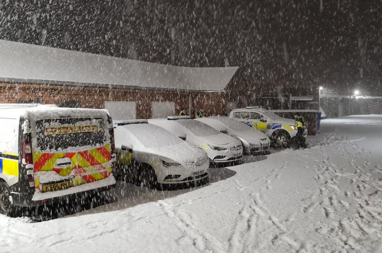 Police warn people ‘not to attempt journeys unless absolutely necessary’ after snowfall