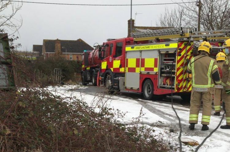 Road partially blocked as three fire crews battle blaze on farm in Wroughton