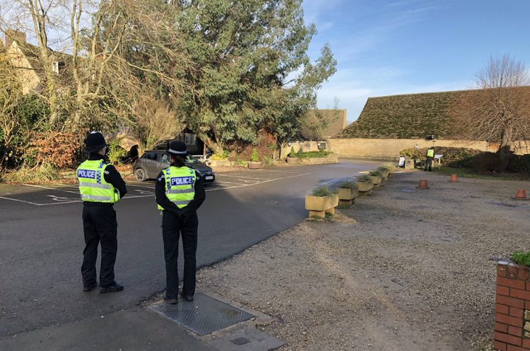 Police establish checkpoint at popular National Trust site as tourists continue to visit
