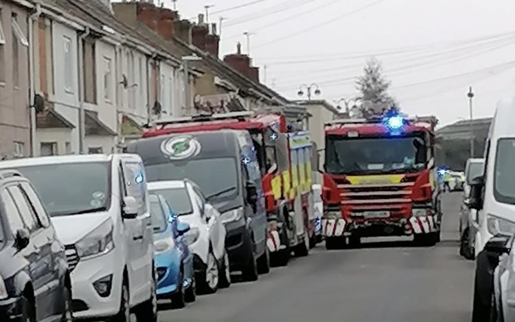 Swindon road closed by police as firefighters tackle back-garden shed blaze