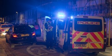 Cops on patrol after assault arrest woman when erratic driving spotted