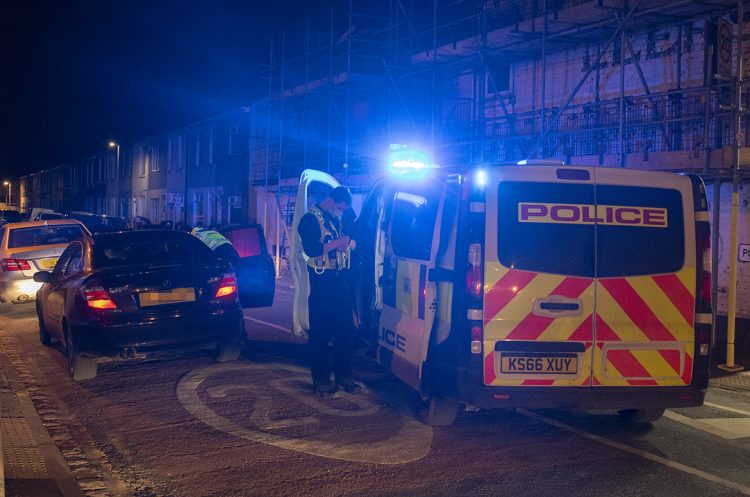 Cops on patrol after assault arrest woman when erratic driving spotted