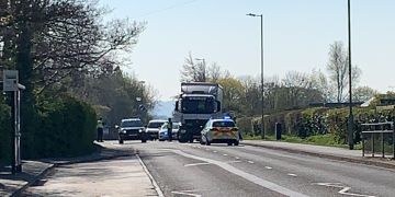 Swindon road partially blocked after crash involving lorry and car