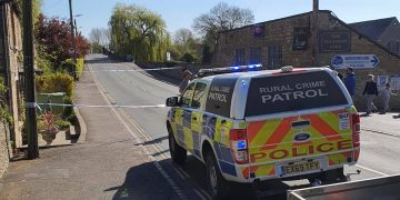 Exclusion zone in place after suspected grenade fished out of River Thames
