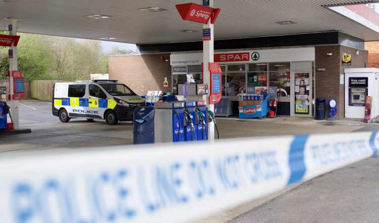 Crime scene at Esso service station following gunpoint robbery