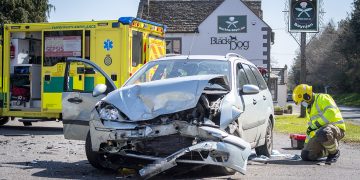 Two-vehicle crash leaves debris scattered across restaurant car park near Calne
