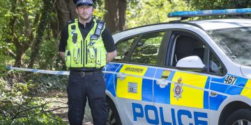 GALLERY: Lawn Woods guarded by police as detectives investigate rape