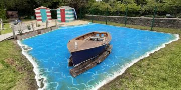 Swindon artist transforms boring tarmac playground into stunning lagoon scene