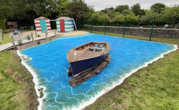 Swindon artist transforms boring tarmac playground into stunning lagoon scene