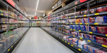 Aldi install new fridge doors which reduce stores’ energy consumption by 20 percent