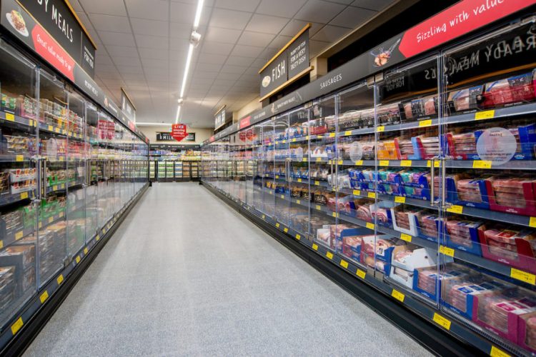Aldi install new fridge doors which reduce stores’ energy consumption by 20 percent