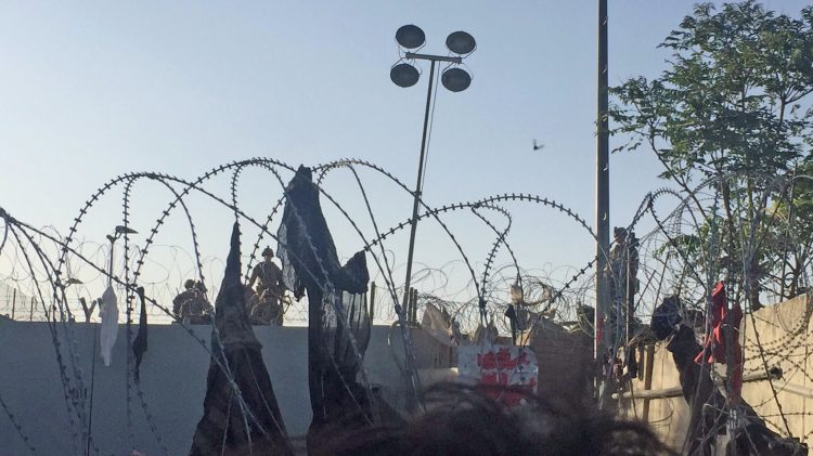 Many dead in Kabul airport explosions as MOD confirms no British casualties