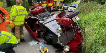 A345 closed after classic car overturns onto roof in road traffic collision