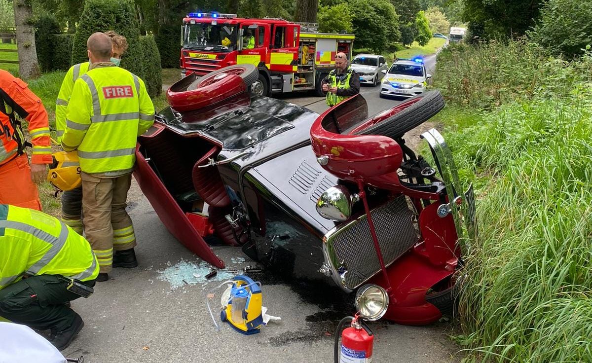 A345 closed after classic car overturns onto roof in road traffic collision