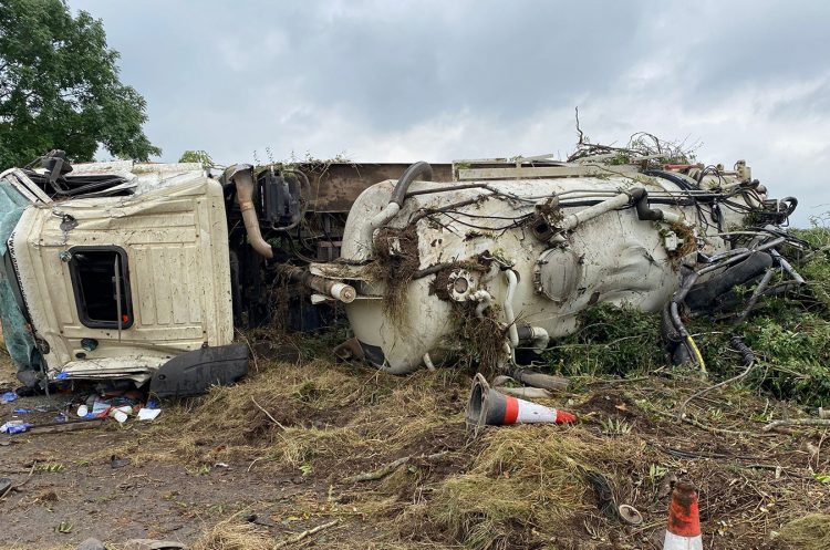 Driver injured after water tanker overturns on country lane near Chippenham