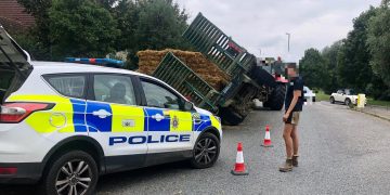 Trailer carrying straw bales overturns – police thank motorists for patience