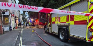 Police guard building after fire ripped through bedsit above Trowbridge shop