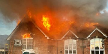 Smoke fills street as firefighters battle primary school blaze in Wiltshire village