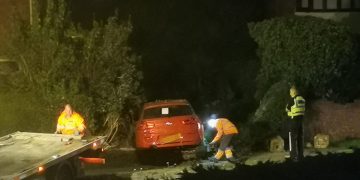 Police investigate after car ploughs through garden wall in Swindon