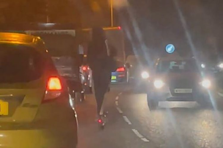 Safety fears after e-scooter rider in black clothing filmed overtaking cars in Swindon