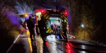 Bus blaze sees A3102 closed in both directions whilst firefighters tackle flames