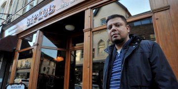 Police hunt racist thugs who targeted Indian restaurant whilst customer ate inside