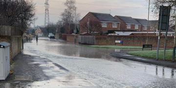 Police close Swindon road after burst water main causes major flooding