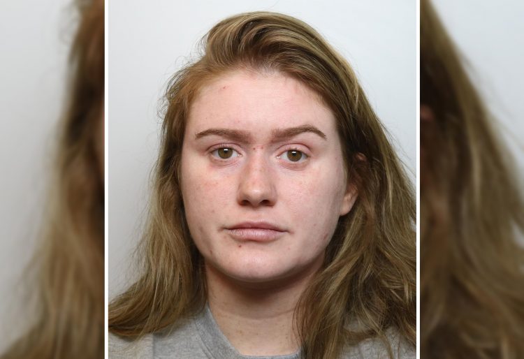 Rachel Barnes custody mugshot Full face of police officer's