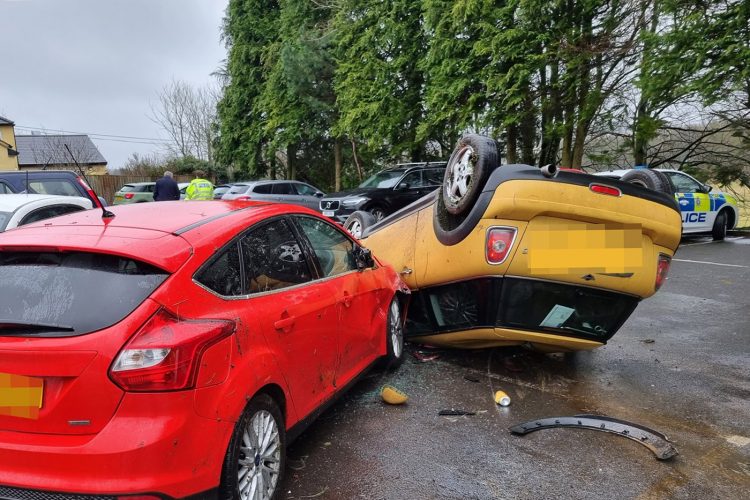 Mini crashes and overturns in Wiltshire pub car park – damaging two parked cars