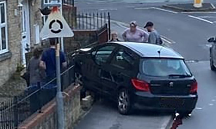 Car collides with garden wall in 20mph zone near primary school in Westbury