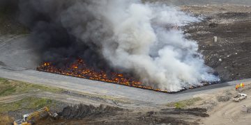 Dramatic photos as firefighters work to extinguish 40,000 tonnes of waste near Calne