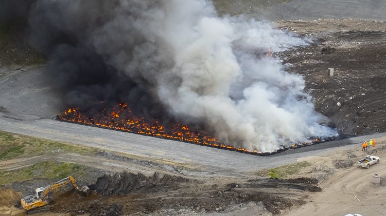 Dramatic photos as firefighters work to extinguish 40,000 tonnes of waste near Calne