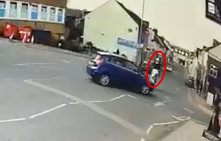Shocking CCTV footage shows moment motorcyclist collides with car crossing into his path