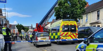 Road in central Swindon shut as emergency services attend serious house fire