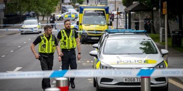 Swindon town centre road closed as person threatens to jump from car park
