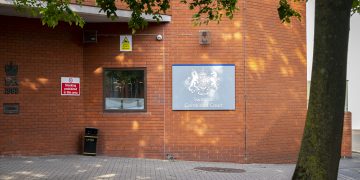 Swindon man in court accused of causing two police officers serious injuries