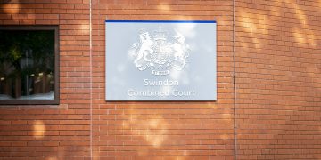 Swindon man in court accused of causing two police officers serious injuries