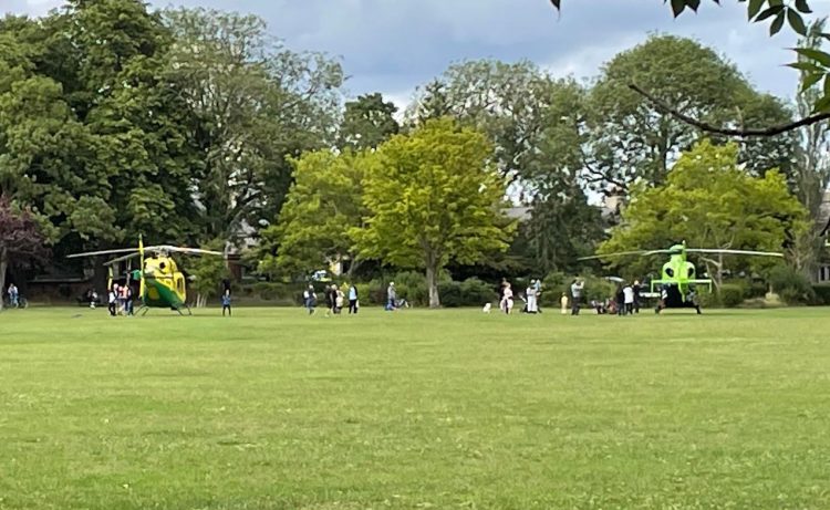 Two air ambulances land in Swindon park as woman found with serious head injury